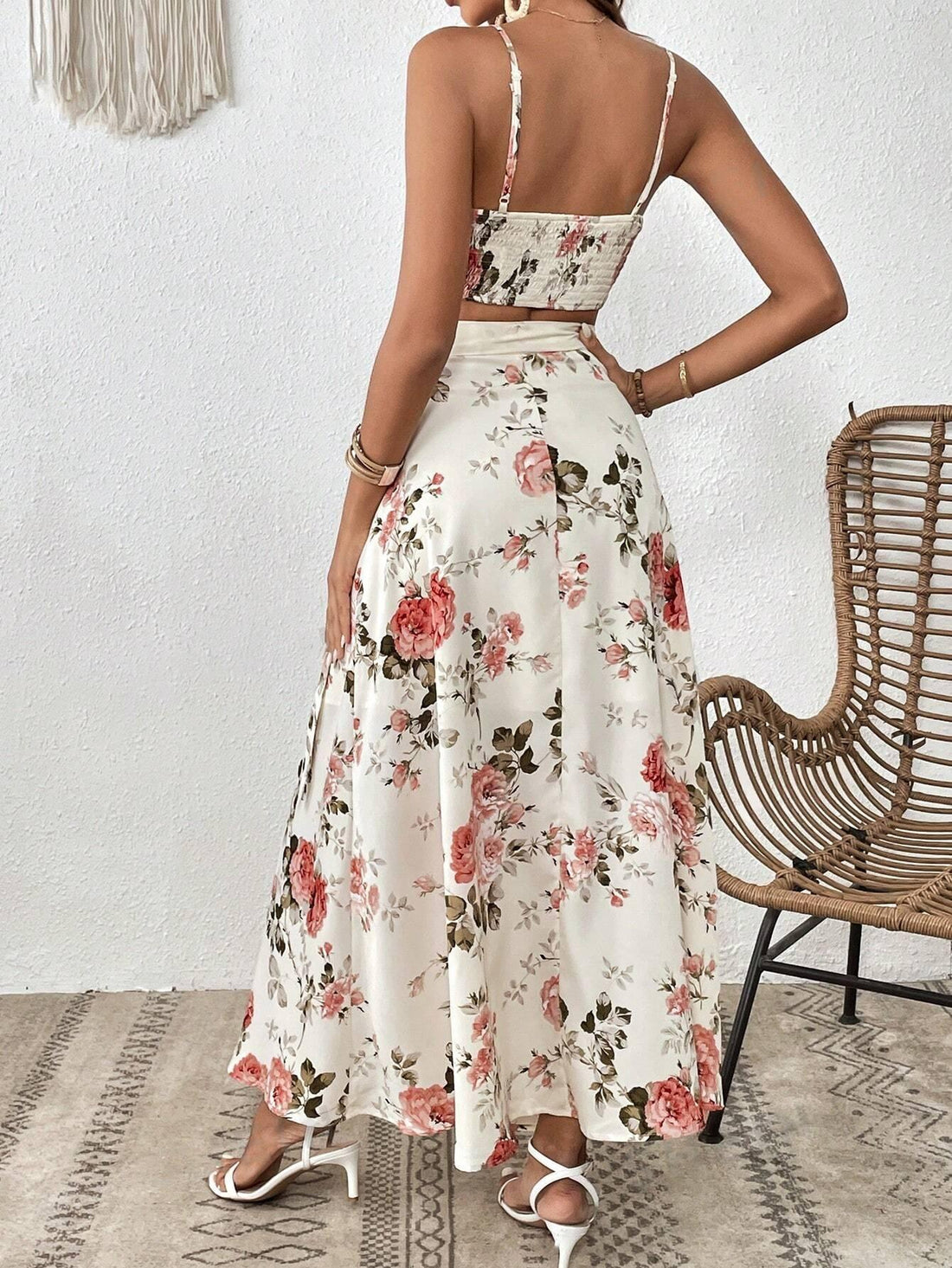 Elevate your summer wardrobe with our Chic Floral Wrap Cami & Side Knot Skirt Set. This stunning set is the perfect blend of style and comfort, with a flattering wrap cami and trendy side knot skirt. Perfect for any summer day, this set will keep you looking chic and feeling confident.