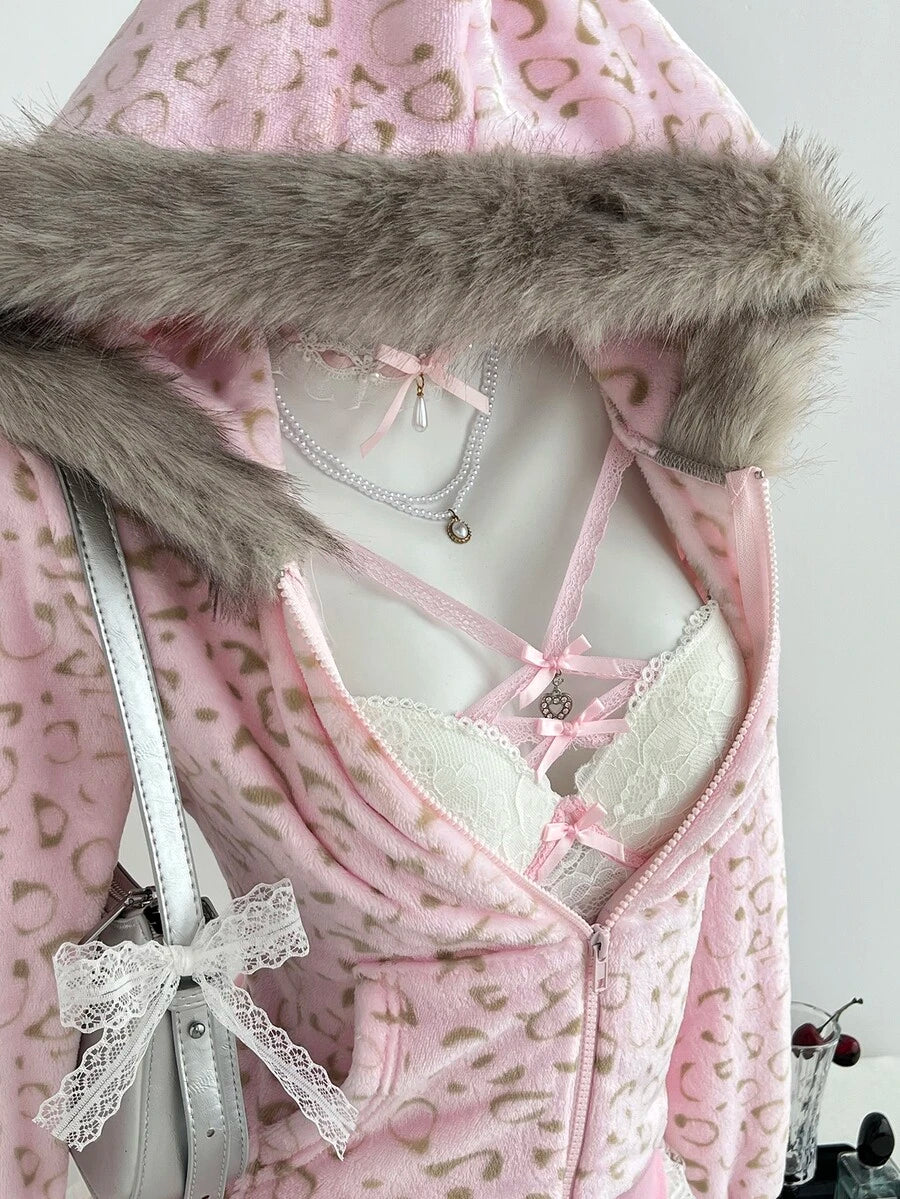 Close detail of blush leopard print faux-fur hooded hoodie