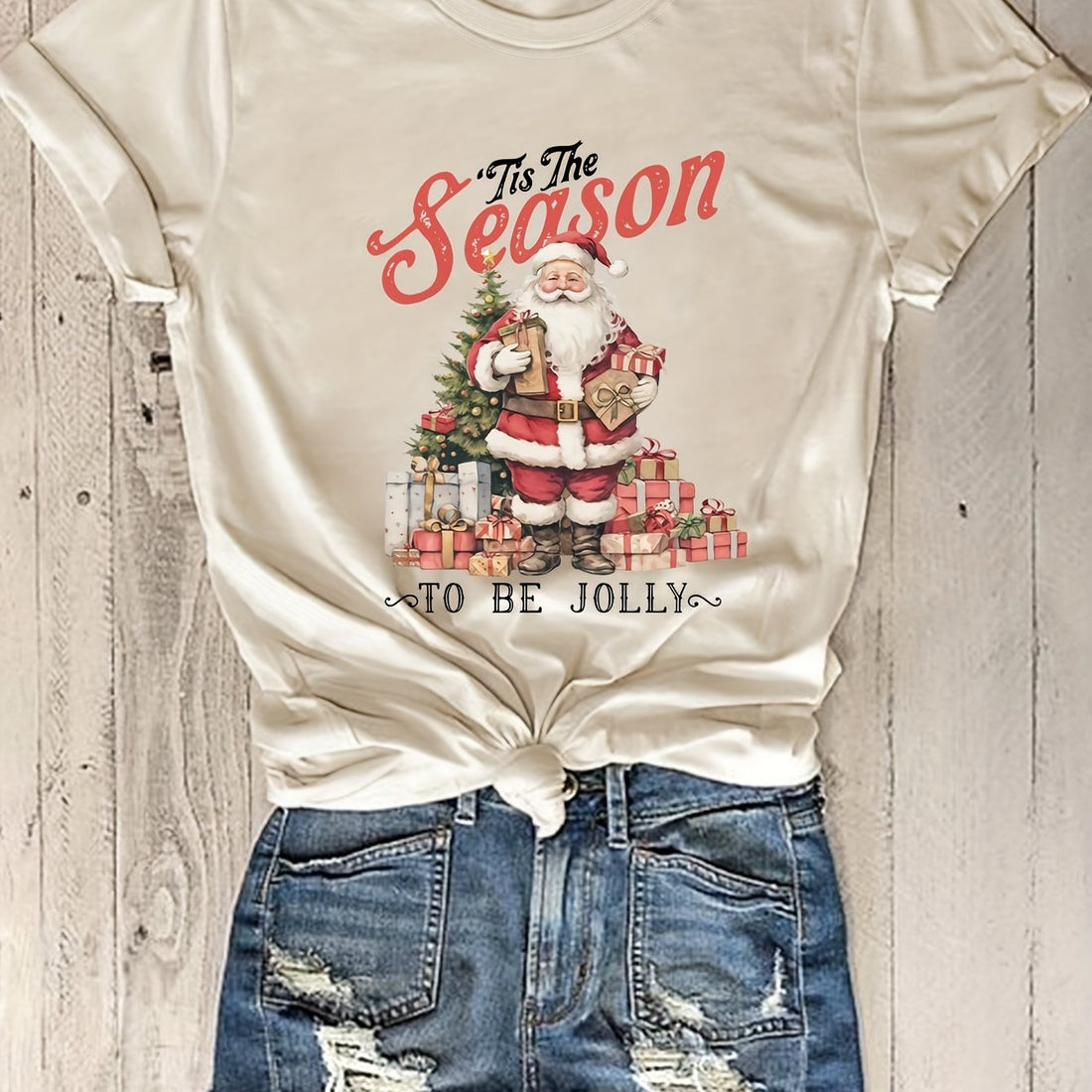 Experience the perfect mix of style and versatility with our Chic Women's Santa Print Tshirt. Its unique design adds a festive touch, making it a must-have fashion accessory for any occasion. Crafted with quality materials, this tshirt offers both comfort and durability, making it a wardrobe staple.
