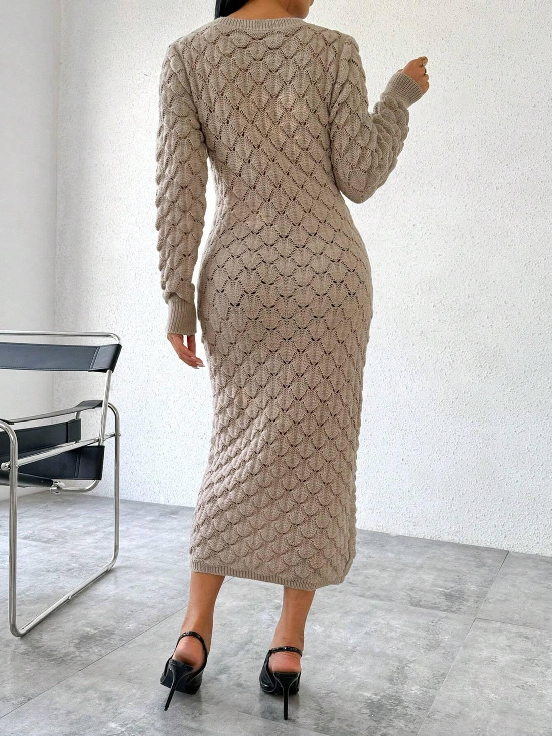 Introducing the Essence of Elegance: Women's Scaly Crew Neck Long Sleeve Sweater Dress. This dress boasts a chic crew neck, comfortable long sleeves, and a unique scaly pattern. Perfect for any occasion, this dress combines style and comfort for a sophisticated look.
