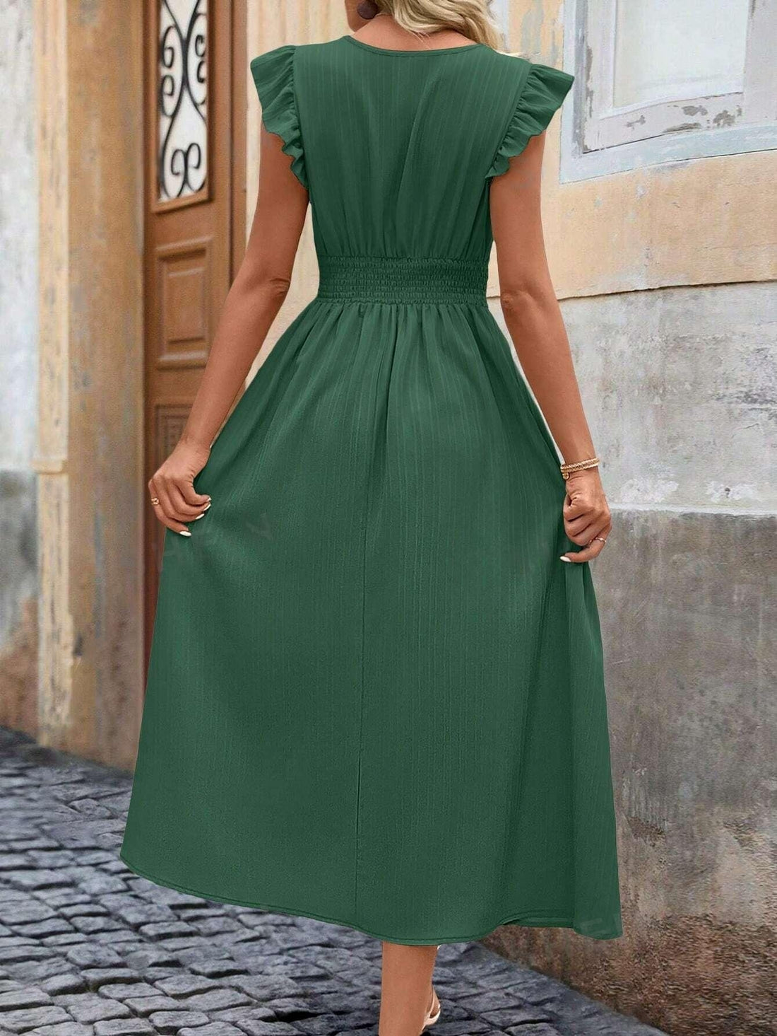 Elevate your style with our Frenchy Elegance dress. The V-neck creates a beautiful silhouette while the pleated ruffle hem adds a touch of femininity. Made for women, this dress is perfect for any occasion. Experience elegance with this must-have piece.