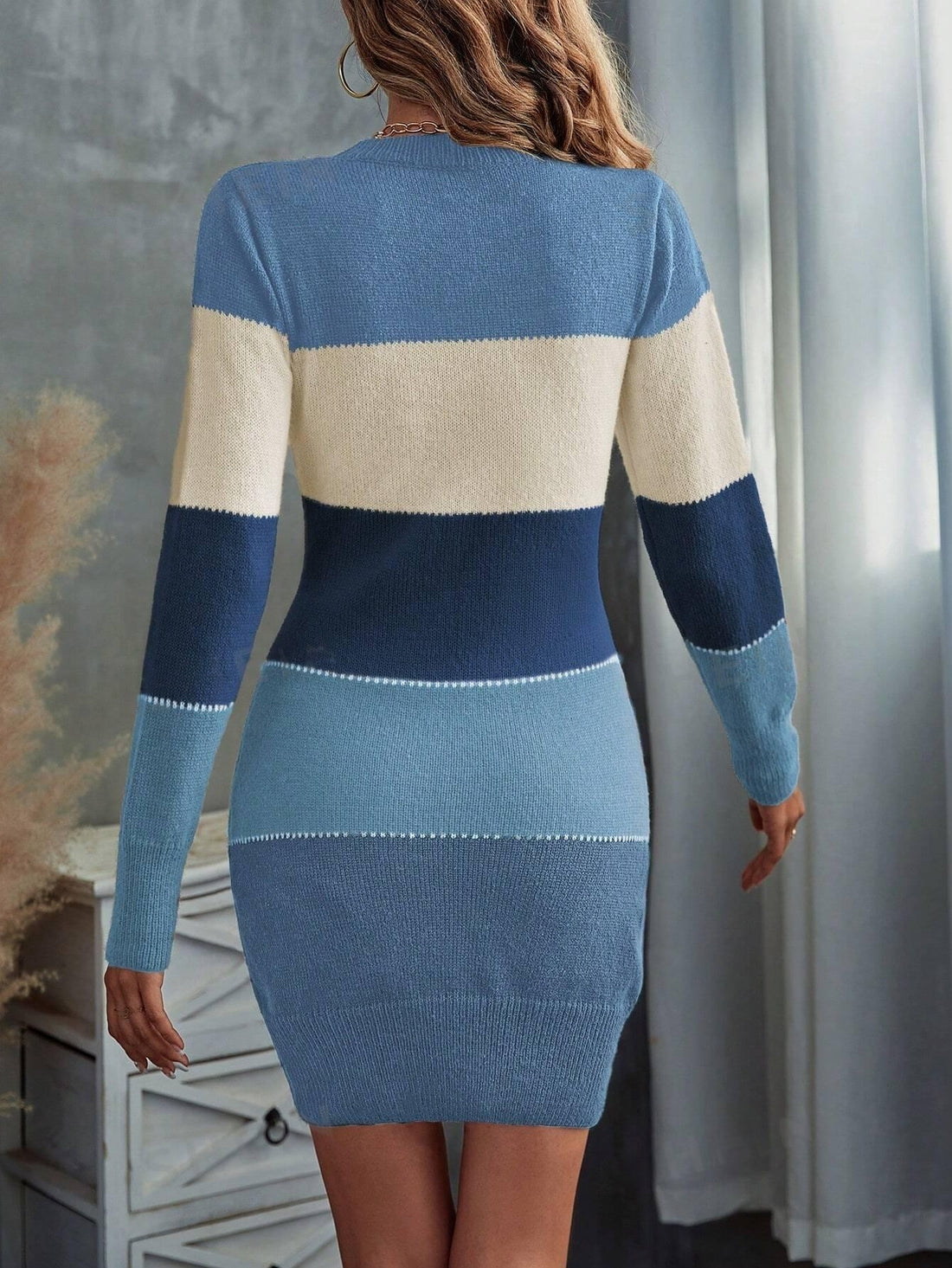 Step up your style game with our Triple Color Bodycon Sweater Dress. Made with cozy fabric, this dress is perfect for any occasion. Its bodycon design accentuates your curves while providing ultimate comfort. Elevate your look with our chic color combination. Available now.