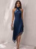 Front view of navy satin halter mini dress with asymmetrical lace hem