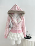Front view of blush leopard hoodie with grey faux-fur hood and pink rib trim