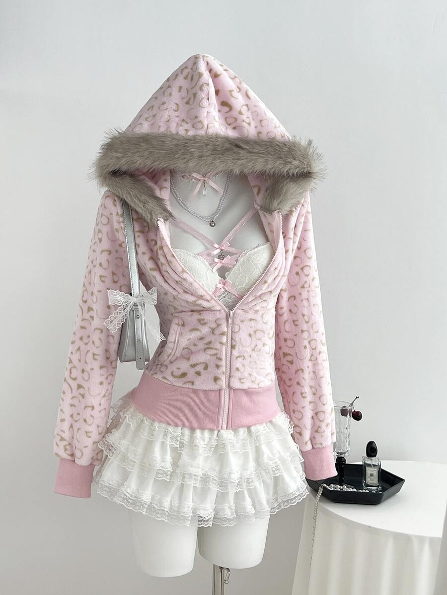 Front view of blush leopard hoodie with grey faux-fur hood and pink rib trim