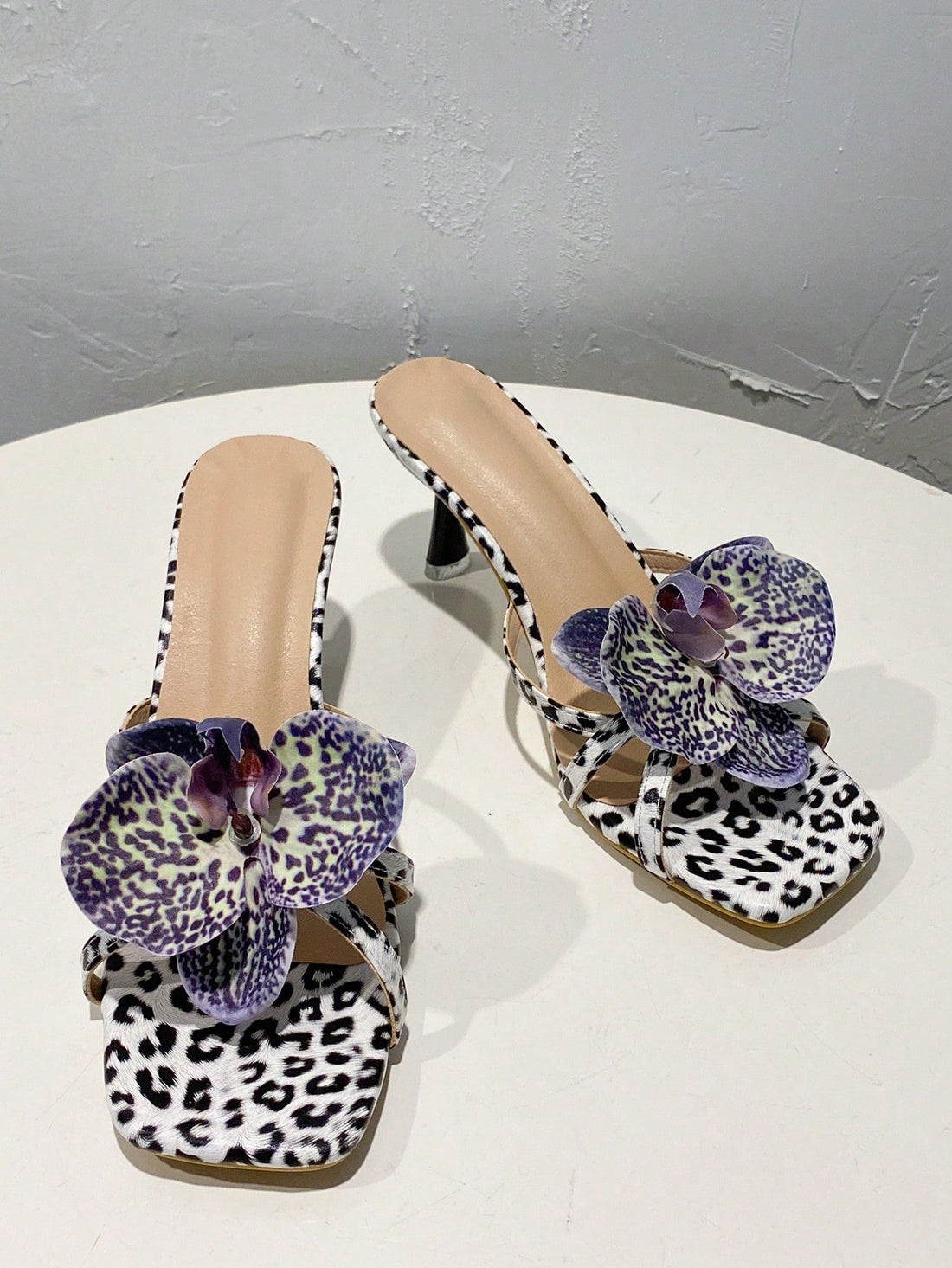 Introducing the 2024 Summer Stiletto Collection for women. These high heel sandals feature 3D printed flower designs, adding a touch of elegance to any outfit. Made with precision and expert craftsmanship, these sandals are perfect for the upcoming summer season. Upgrade your shoe game with these stunning and unique heels.