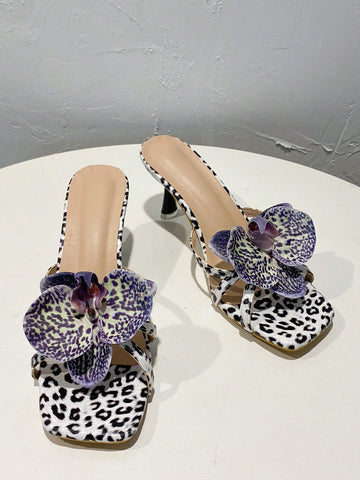 Introducing the 2024 Summer Stiletto Collection for women. These high heel sandals feature 3D printed flower designs, adding a touch of elegance to any outfit. Made with precision and expert craftsmanship, these sandals are perfect for the upcoming summer season. Upgrade your shoe game with these stunning and unique heels.