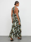 Shop an olive green floral V neck A line maxi dress, perfect for summer vacations, festivals, beach trips, resort getaways, brunch, and outdoor events.