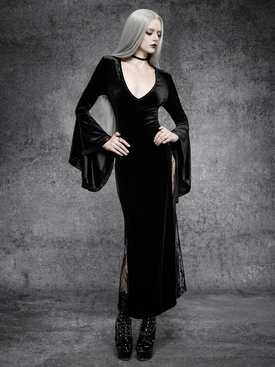 Angled front view of fitted black gothic velvet maxi dress with deep V neckline and lace split