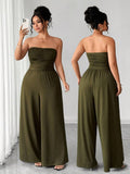 Front and back views of army-green strapless ruched jumpsuit