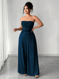 Full front view of navy-blue strapless jumpsuit with wide legs