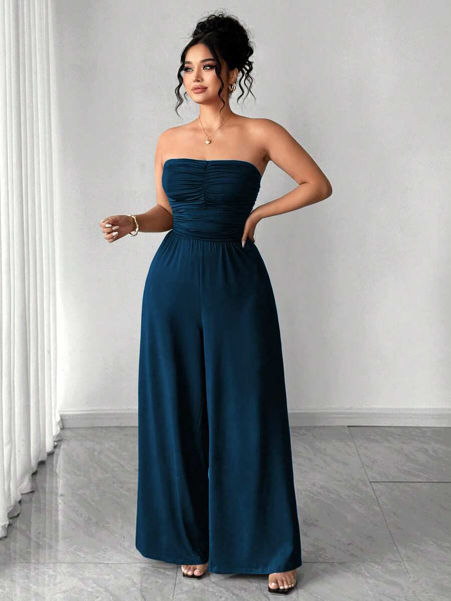 Full front view of navy-blue strapless jumpsuit with wide legs