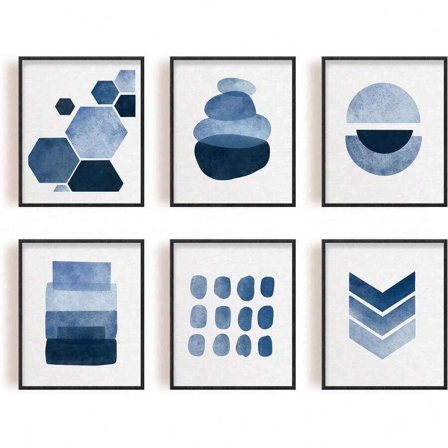 Frontal view of six black-framed blue geometric watercolor canvas prints on a white background