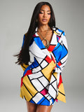 Front mid view of colorful geometric print shirt mini dress with collared V-neck and long sleeves