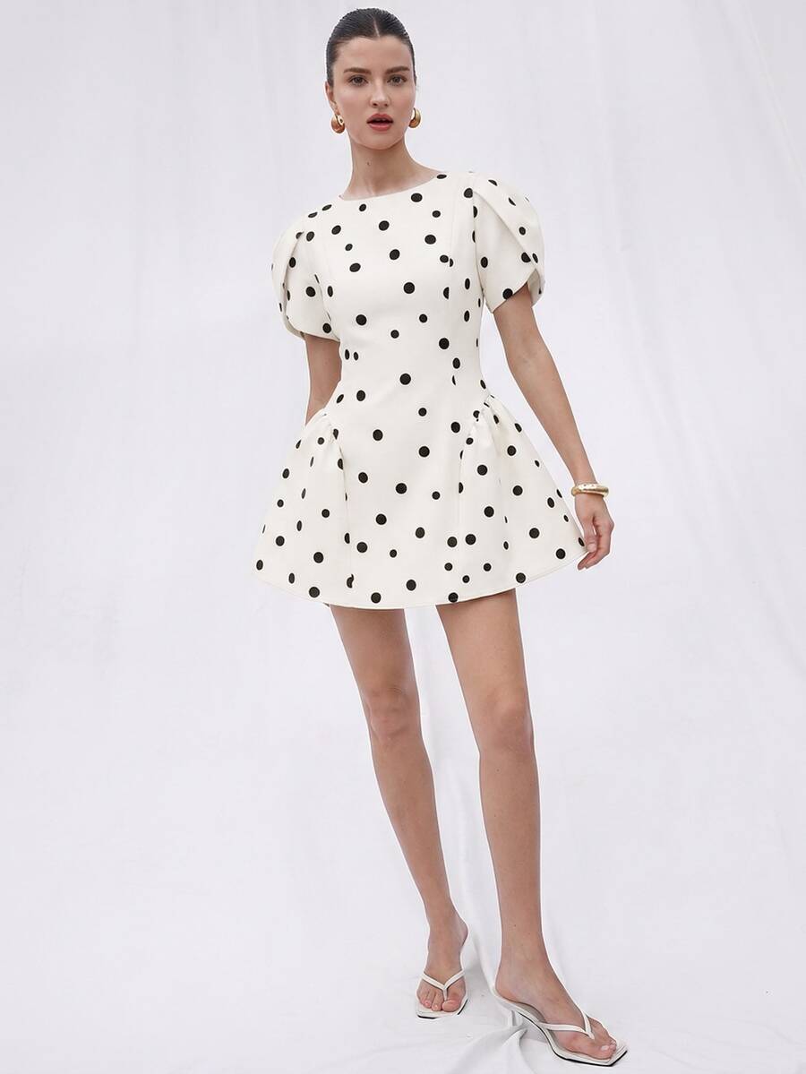 Full front view of ivory and black polka dot puff sleeve mini dress