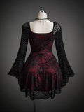 Front view of burgundy black floral lace skater dress with square neck and bell sleeves