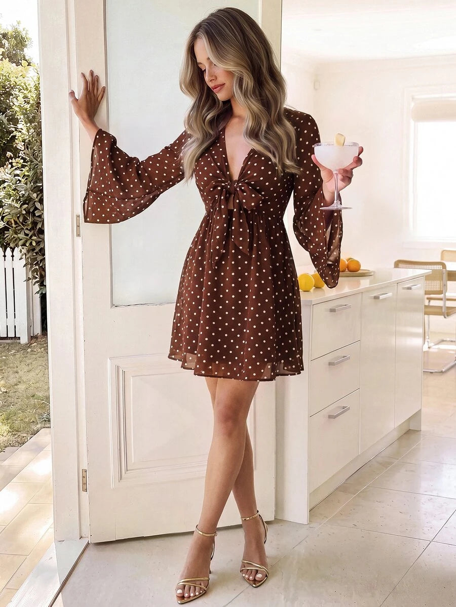 Brown polka dot empire waist dress with flared hem