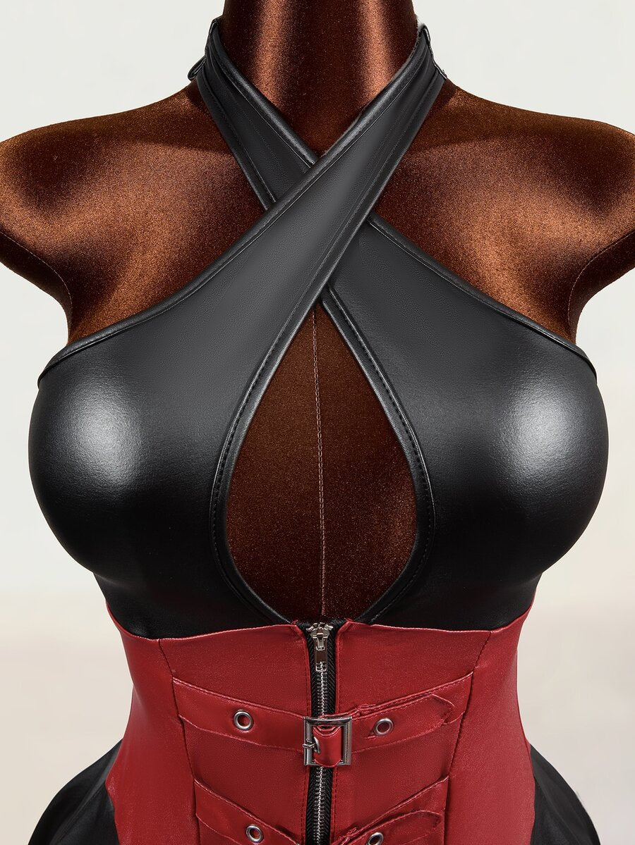 Close-up of black halter keyhole bodice with red zipper corset panel and buckle straps