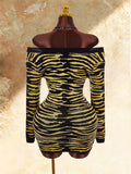 Product back view of fitted black and yellow tiger stripe mini knit dress