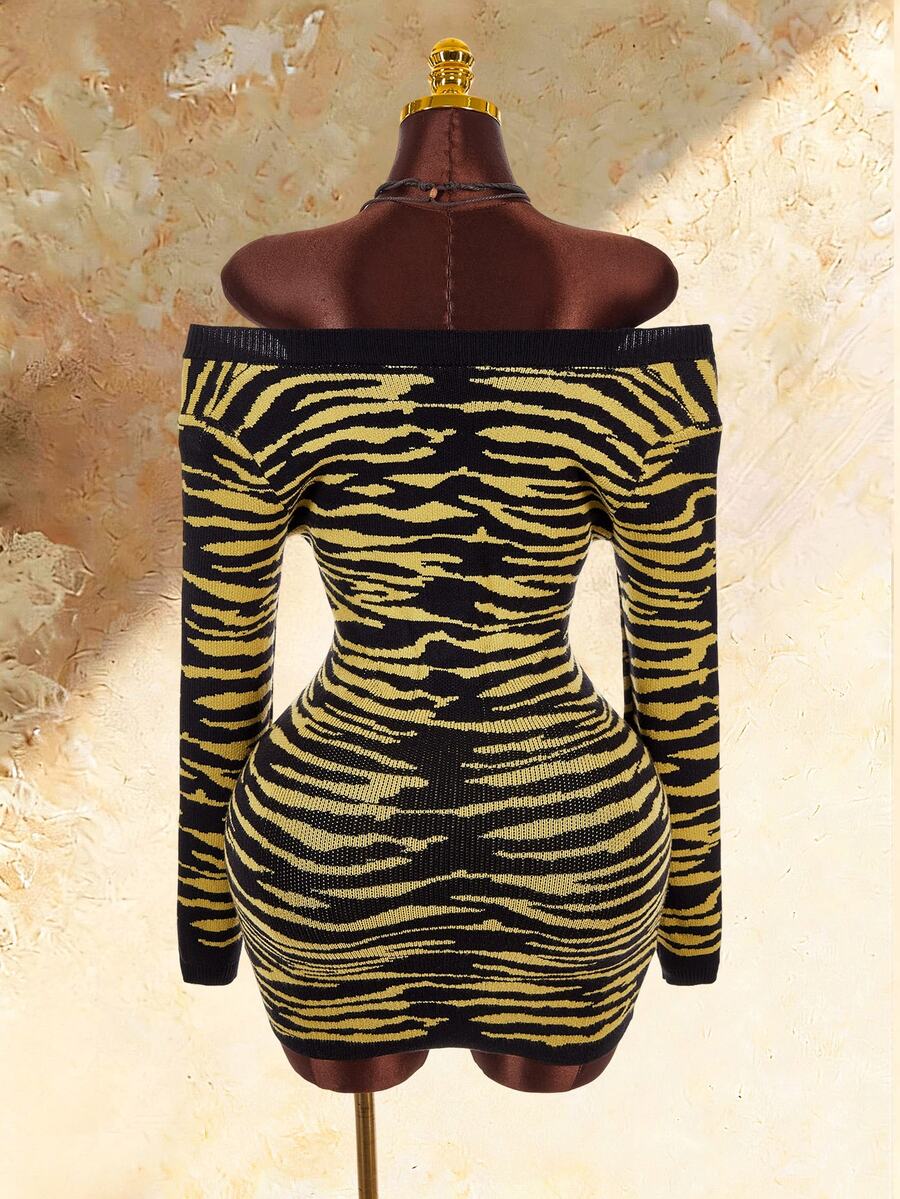Product back view of fitted black and yellow tiger stripe mini knit dress