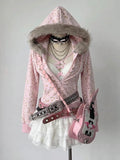 Styled front view of blush leopard faux-fur hood zip-up jacket