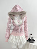 Front view of pink leopard zip-up hoodie with grey faux-fur hood trim