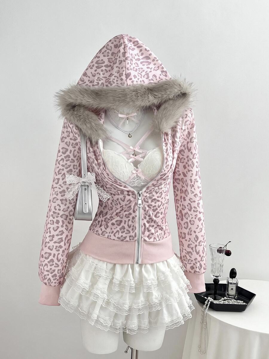 Front view of pink leopard zip-up hoodie with grey faux-fur hood trim