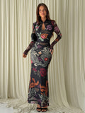 Full-length front view of multicolor print mermaid dress styled for evening