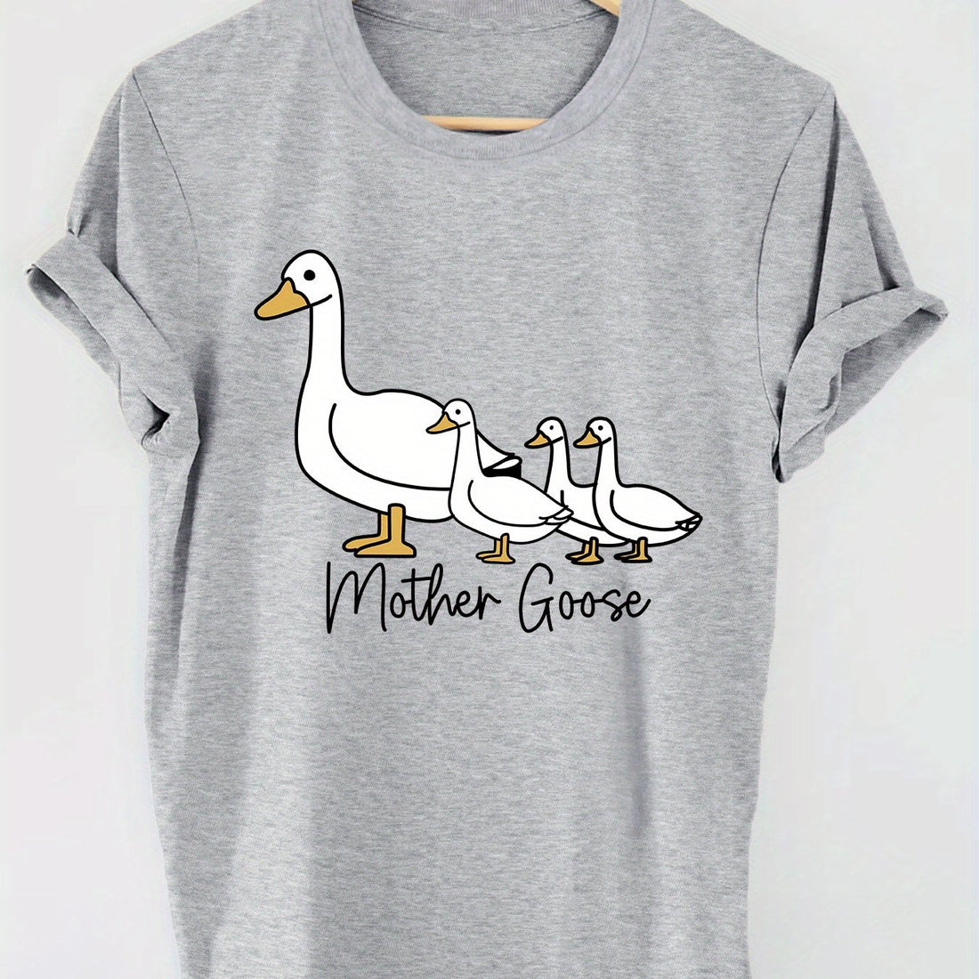 This Mother's Day, show your love with our Goose Print T-shirt! Made with a comfortable and stylish crew neck design, it's perfect for summer and spring. Celebrate with a unique and exclusive print that any mother would be proud to wear.