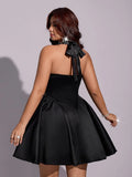 Plus-size black fit-and-flare halter party dress front view
