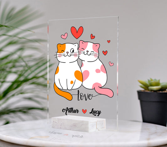 This acrylic product, AP003, offers personalized name options along with adorable cat couple designs, perfect for celebrating your love this Valentine's Day. The acrylic material provides durability and a sleek finish, making it a long-lasting and charming addition to any home or office space.