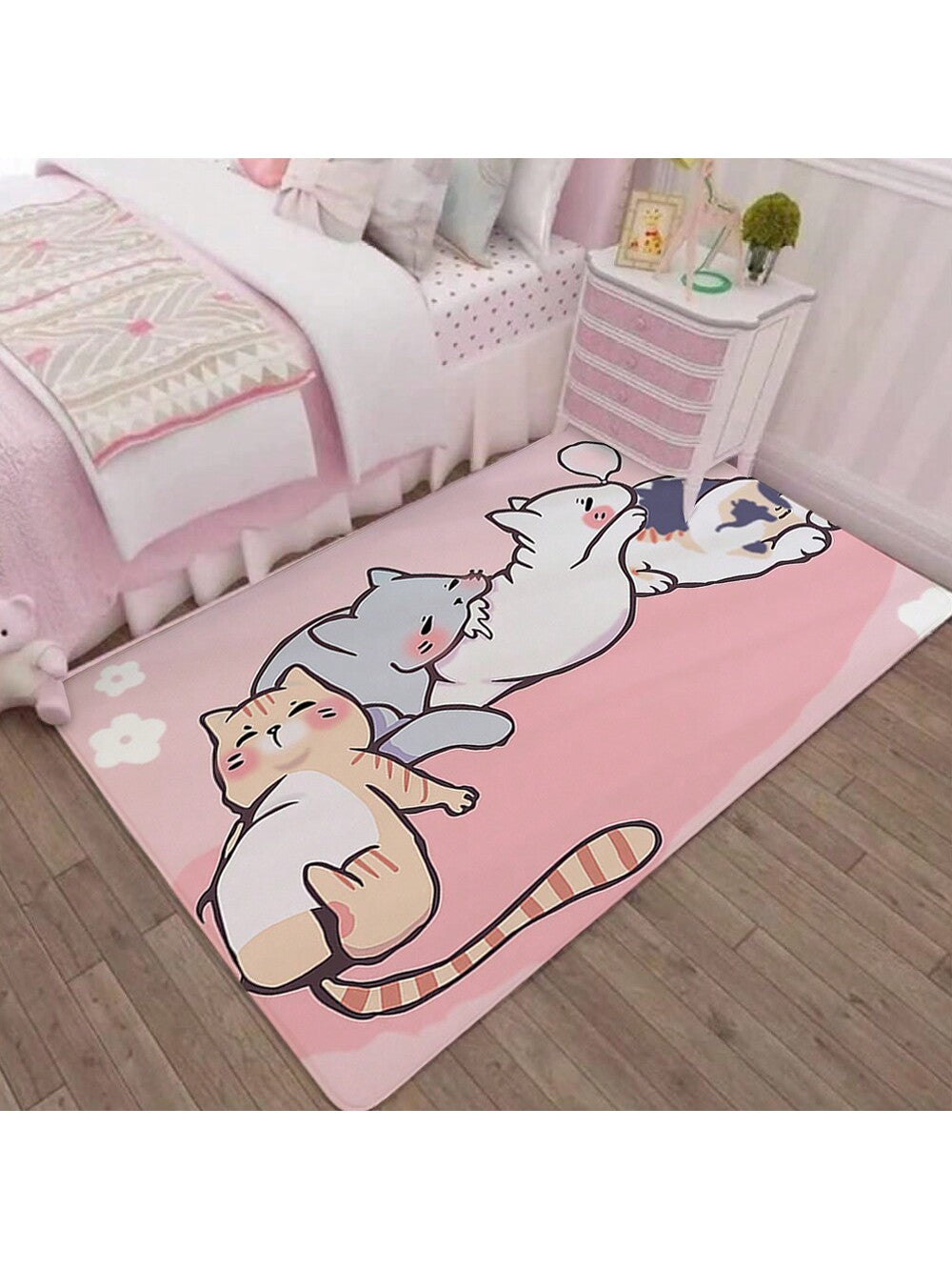 Introducing our Adorable Cartoon Cat Patterned Washable Carpet, perfect for adding a cozy touch to any bedroom decor. With its playful cat pattern and washable design, this carpet offers both style and convenience. Made with high-quality materials, this carpet is sure to bring a smile to your face and add a touch of charm to your living space.