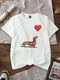 Celebrate your love for pups with this playful summer tee featuring an adorable dachshund holding a heart-shaped balloon. Lightweight and casual, it’s perfect for sunny days, adding a touch of whimsy to your outfit while keeping you comfortable and cool. Let your style wag its tail wherever you go!