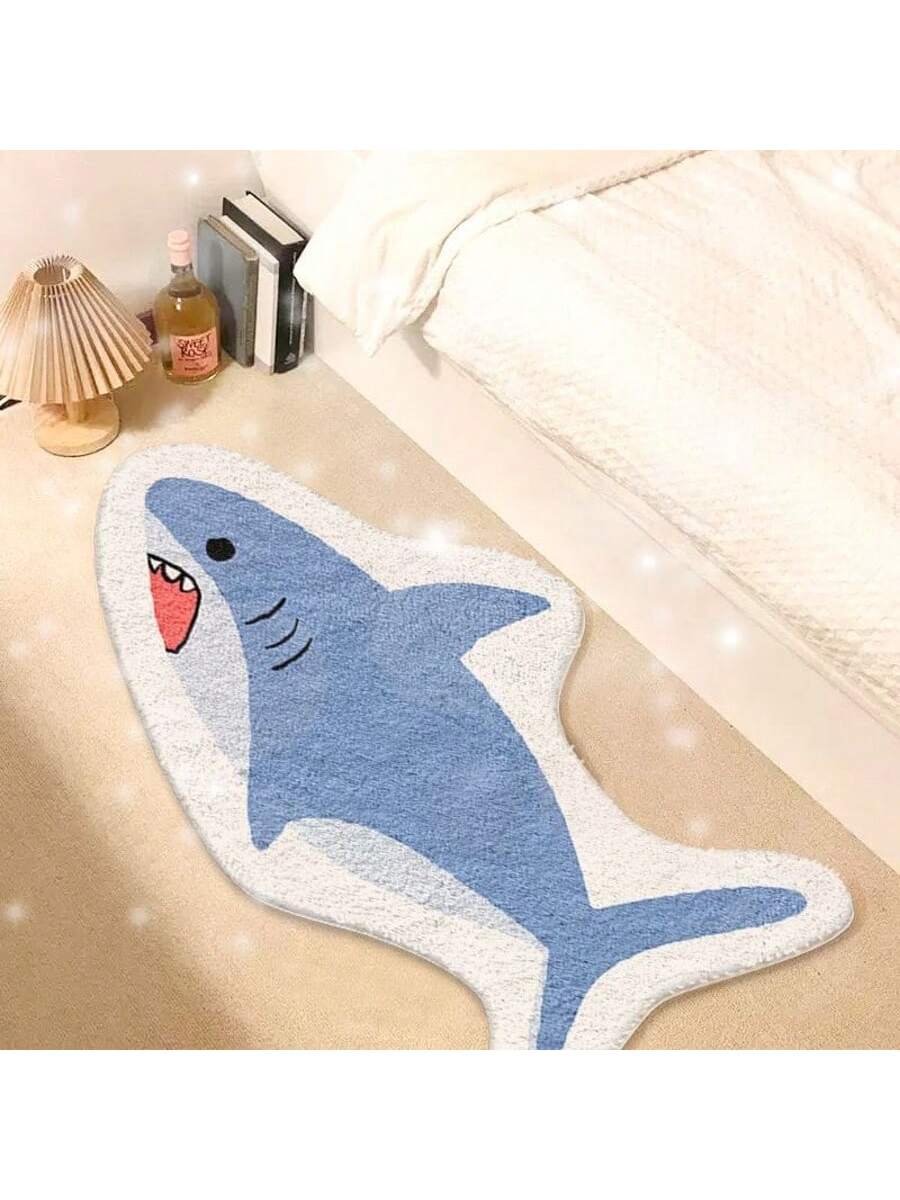 Dive into comfort with this adorable plush shark bathroom mat! Soft and cozy underfoot, it features a non-slip backing for safety and is fully washable for easy care. Its unique asymmetrical design adds a splash of fun and style to any bathroom or bedroom, making every step a delightful experience. Perfect for those who love a playful touch in their home decor!