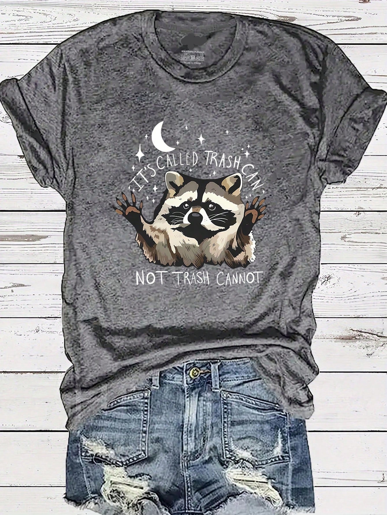 Get ready to rock the cuteness with our Adorable Raccoon Graphic T-Shirt for Women! It's the perfect combination of comfort and style, making it ideal for your everyday casual wear. The playful raccoon graphic adds a touch of quirkiness to your outfit. Grab yours now!
