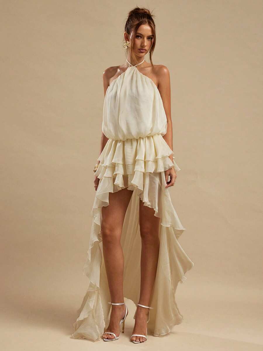 Front view of ivory halter high low dress with layered ruffle mini front