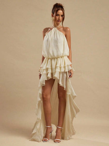 Front view of ivory halter high low dress with layered ruffle mini front