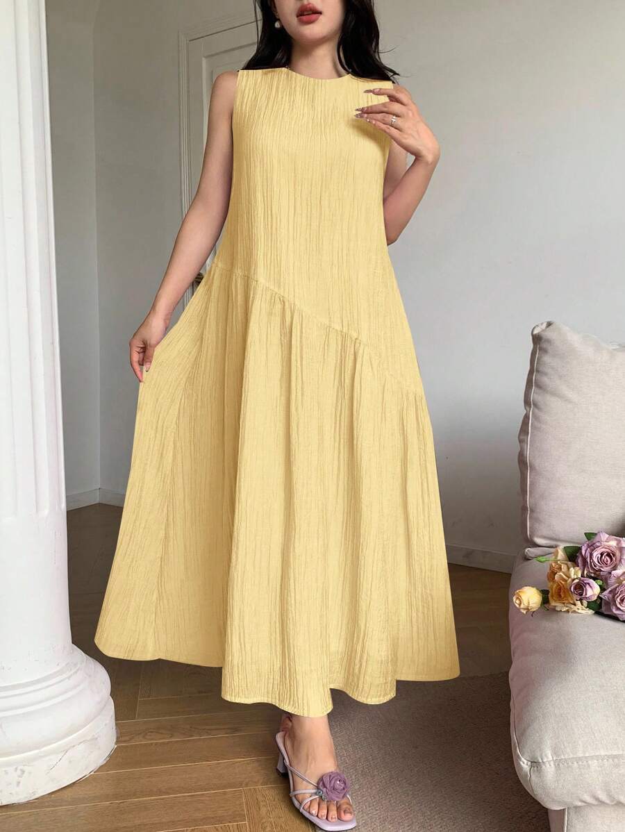 This sleeveless summer dress plays with asymmetry for a fun, breezy look that flatters every angle. Its loose fit keeps you cool and comfy, making it your go-to for beach days, city strolls, or sunset dinners on vacation. Effortless style meets endless possibilities—where will your dress take you?