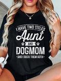 Celebrate two amazing titles with one shirt! This Aunt & Dog Mom Title Tee is the perfect gift for the dog-loving aunt in your life. Show off your love for your furry family members and your awesome aunt status in this fun and quirky tee.