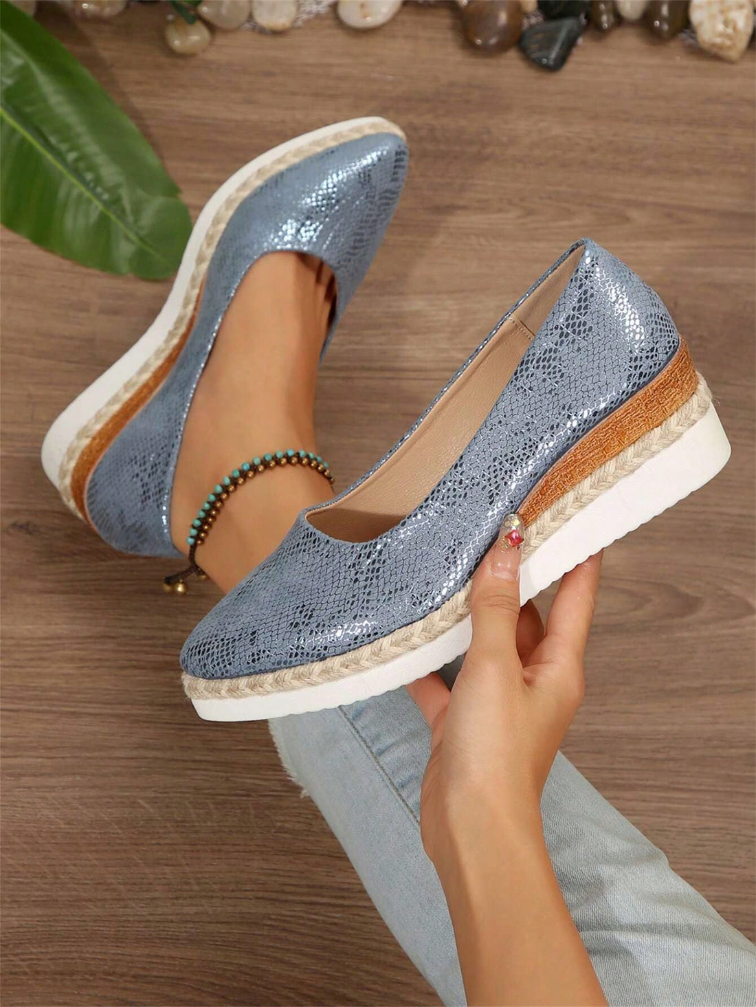 Introducing Autumn Elegance, the stylish and functional platform wedge slip-on pumps. Designed with a waterproof sole, these pumps provide practicality while adding elegance to your outfit. With a comfortable wedge heel, you can confidently walk in any weather. Elevate your style and stay dry with Autumn Elegance.