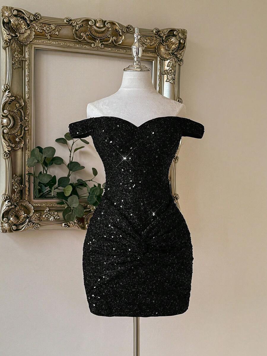 Turn heads all night with this Avant-Garde Red Sequin Mini Dress. Its strapless, off-shoulder design perfectly blends bold style and party-ready glamour. Dazzle under the nightclub lights, feeling confident and effortlessly chic wherever you go. Perfect for those who love to sparkle and dance the night away!