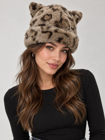 Close-up of fluffy leopard-print beanie texture and pointed cat-ear details