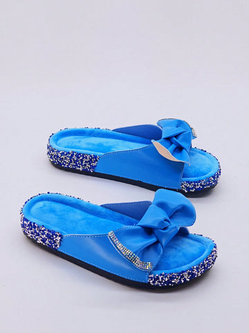 Add a touch of elegance to your beach vacation with our Black Bow Knot Diamond Studded Slide Sandals. These trendy flats feature a stylish knot design and studded with diamonds for a chic look. Perfect for a day of relaxation, these slides will elevate your beach style.
