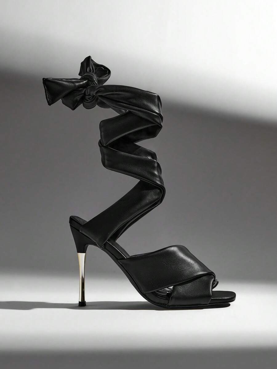 Turn heads with these Black Lace Up Stiletto Sandals for Women, the perfect statement heels for elegant evenings, special occasions, and fashionable nights out. Featuring a sleek open-toe silhouette and delicate lace-up straps, these heels create a flattering, leg-lengthening look that pairs effortlessly with dresses, skirts, jumpsuits, and tailored outfits.