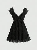Black polka-dot mini dress with lace-trim V-neck