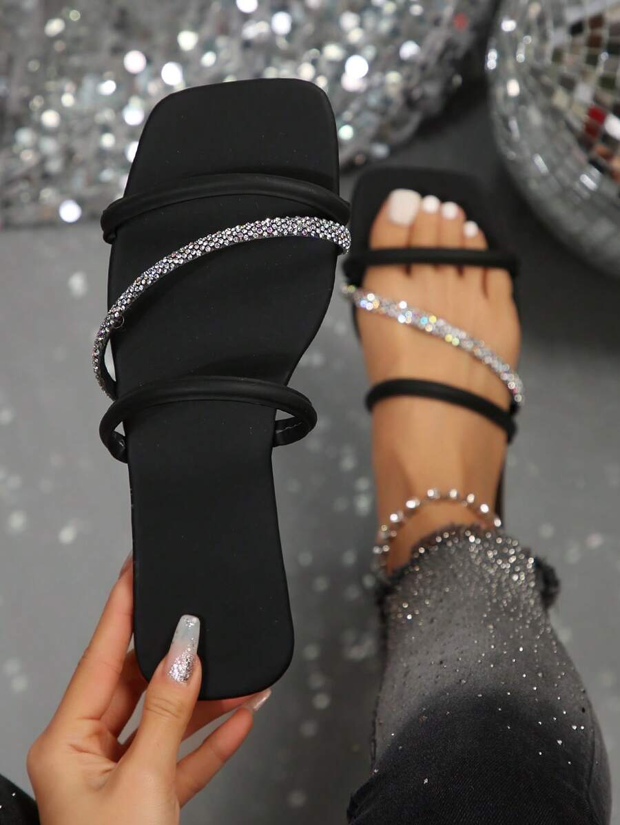 Black rhinestone open toe flat slide sandals with square toe and padded straps