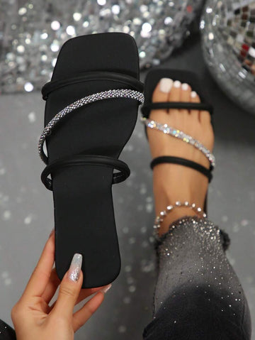 Black rhinestone open toe flat slide sandals with square toe and padded straps
