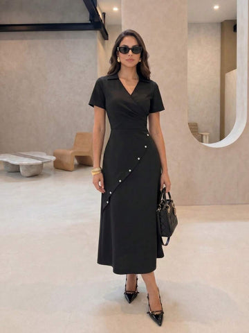 Black V-neck wrap midi dress with diagonal button detail