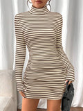 Front view of cream and dark brown striped turtleneck mini dress