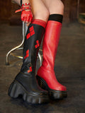 Elevate your style this fall with our Black and Red Dual-Color Knee-High Boots. These stylish boots combine a sleek black design with a pop of fiery red, perfect for adding a bold touch to any outfit. Made from high-stretch material, they offer both fashion and comfort, making them a must-have for the season.
